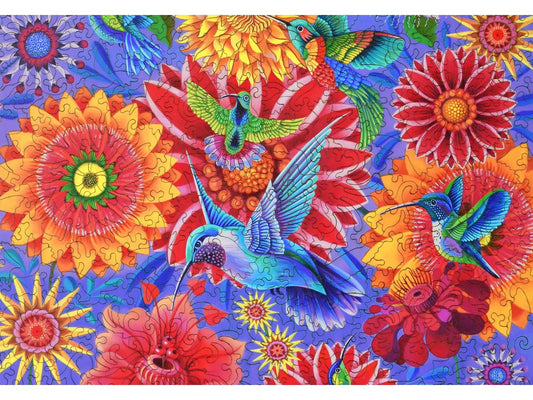 A closeup of the front of the puzzle, A Charm of Hummingbirds, showing the detail in the pieces.