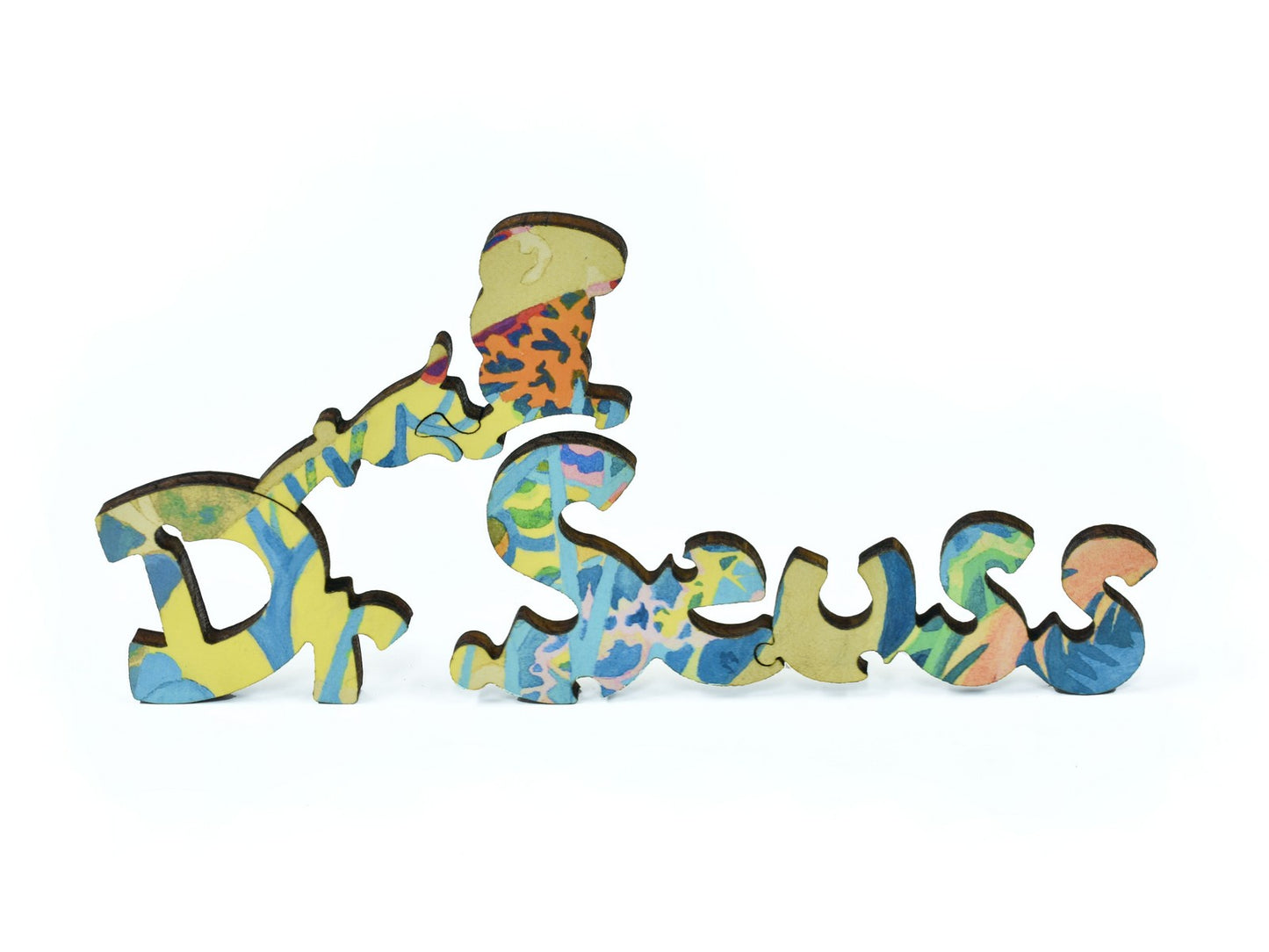 A closeup of pieces in the shape of the words "Dr. Suess".