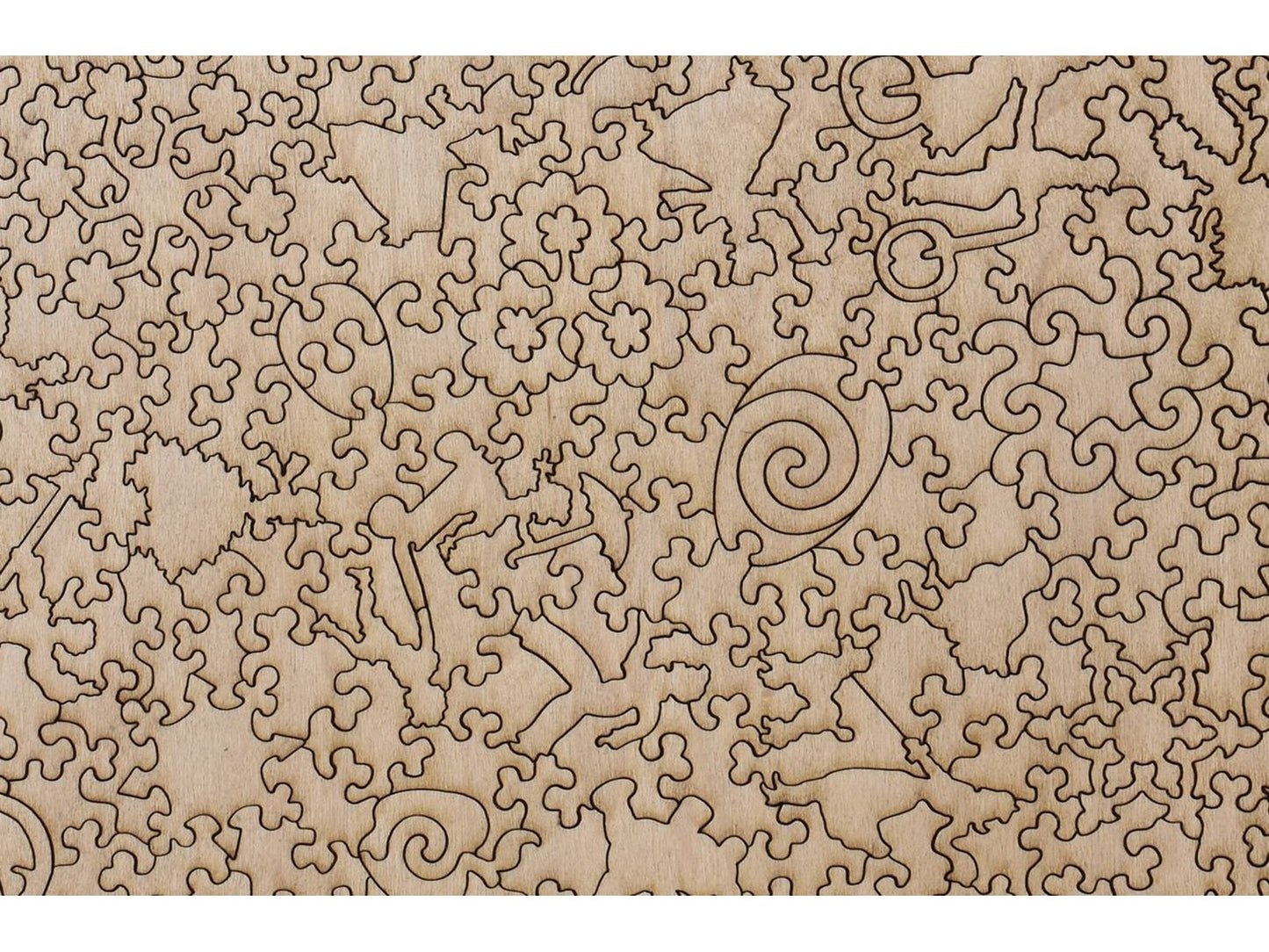 A closeup of the back of the puzzle, Easter Collage, showing the detail in the pieces.