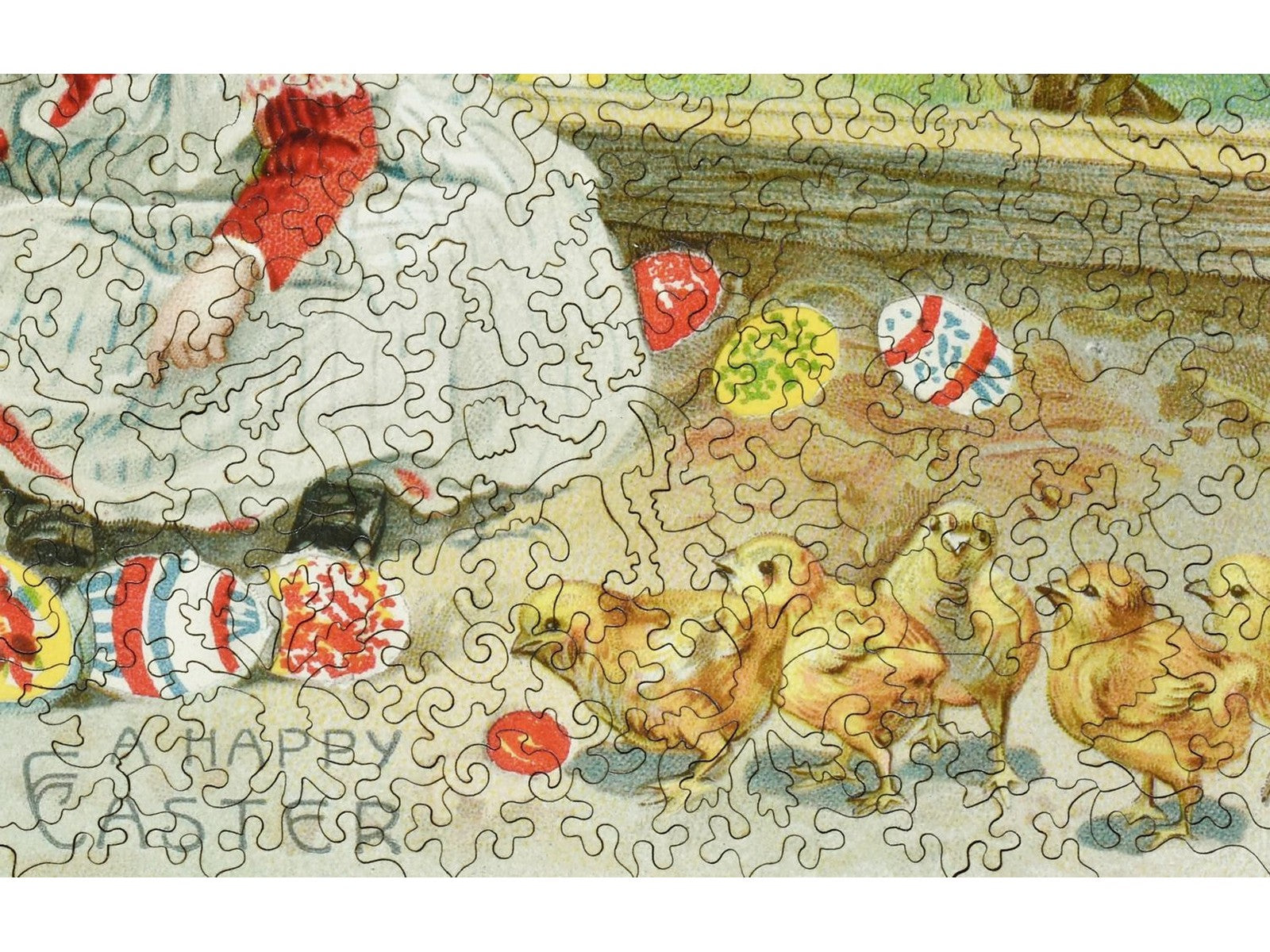 A closeup of the front of the puzzle, Easter Egg Party, showing the detail in the pieces.