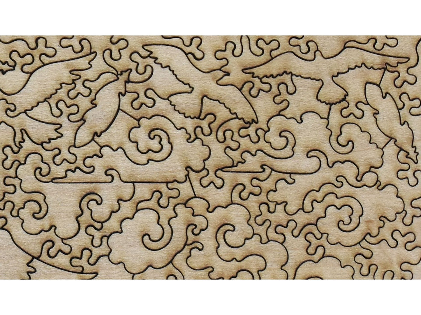 A closeup of the back of the puzzle, Étretat: The Beach and the Falaise d'Amont, showing the detail in the pieces.