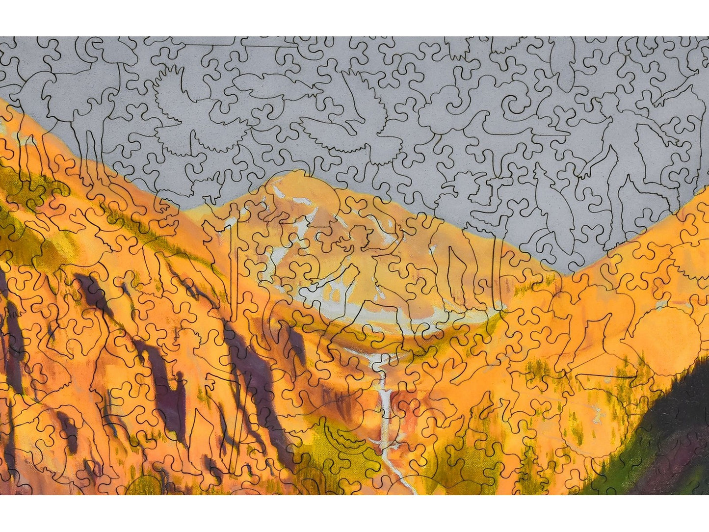 A closeup of the front of the puzzle showing Bridal Veil Falls in Telluride, Colorado.
