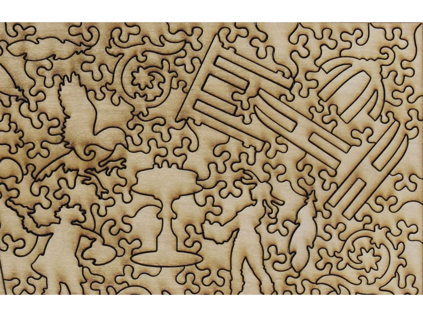 A closeup of the back of the puzzle, The Pink Tablecloth, showing the detail in the pieces.