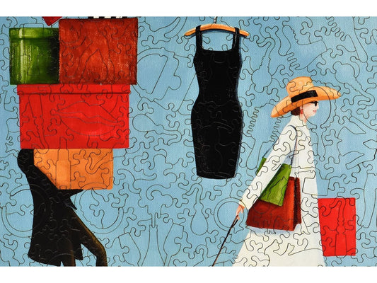 A closeup of the front of the puzzle, The Pursuit of Happiness, showing the detail in the pieces.