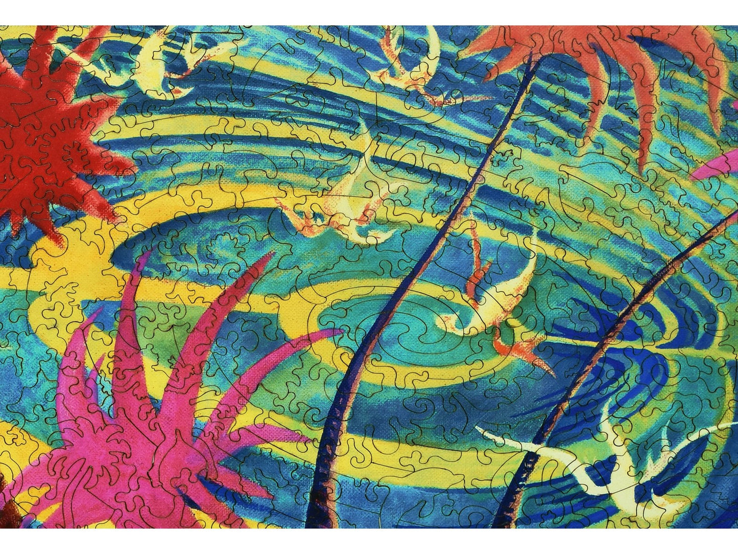 A closeup of the front of the puzzle, Tahitian Landscape, showing the detail in the pieces.