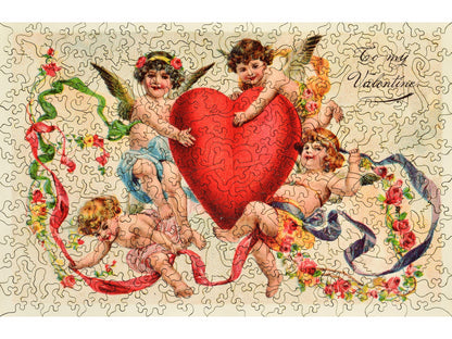 The front of the puzzle, Valentine Ribbons, which shows four cherubs around a large heart.