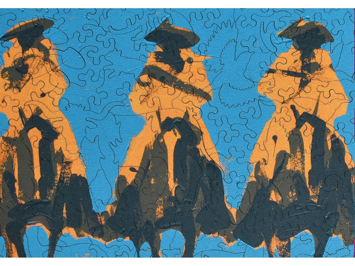 A closeup of the front of the puzzle, Vaqueros Andres, by Duke Beardsley.