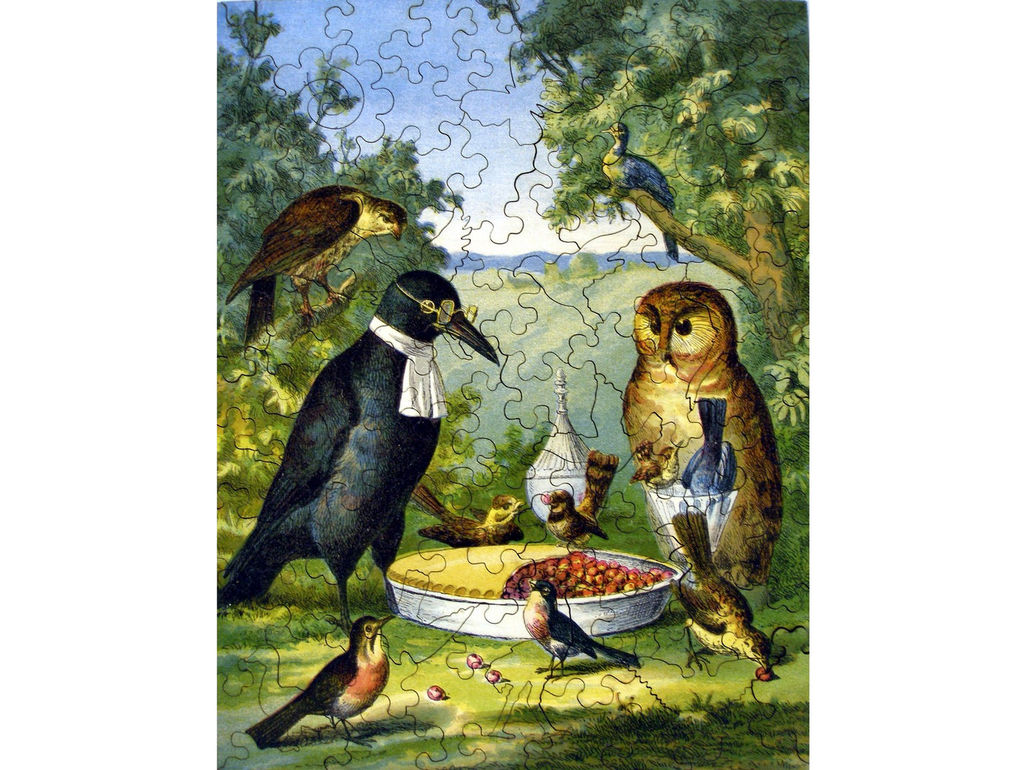 The front of the puzzle, Wedding of Jenny Wren Kids, which shows a group of birds eating a pie.