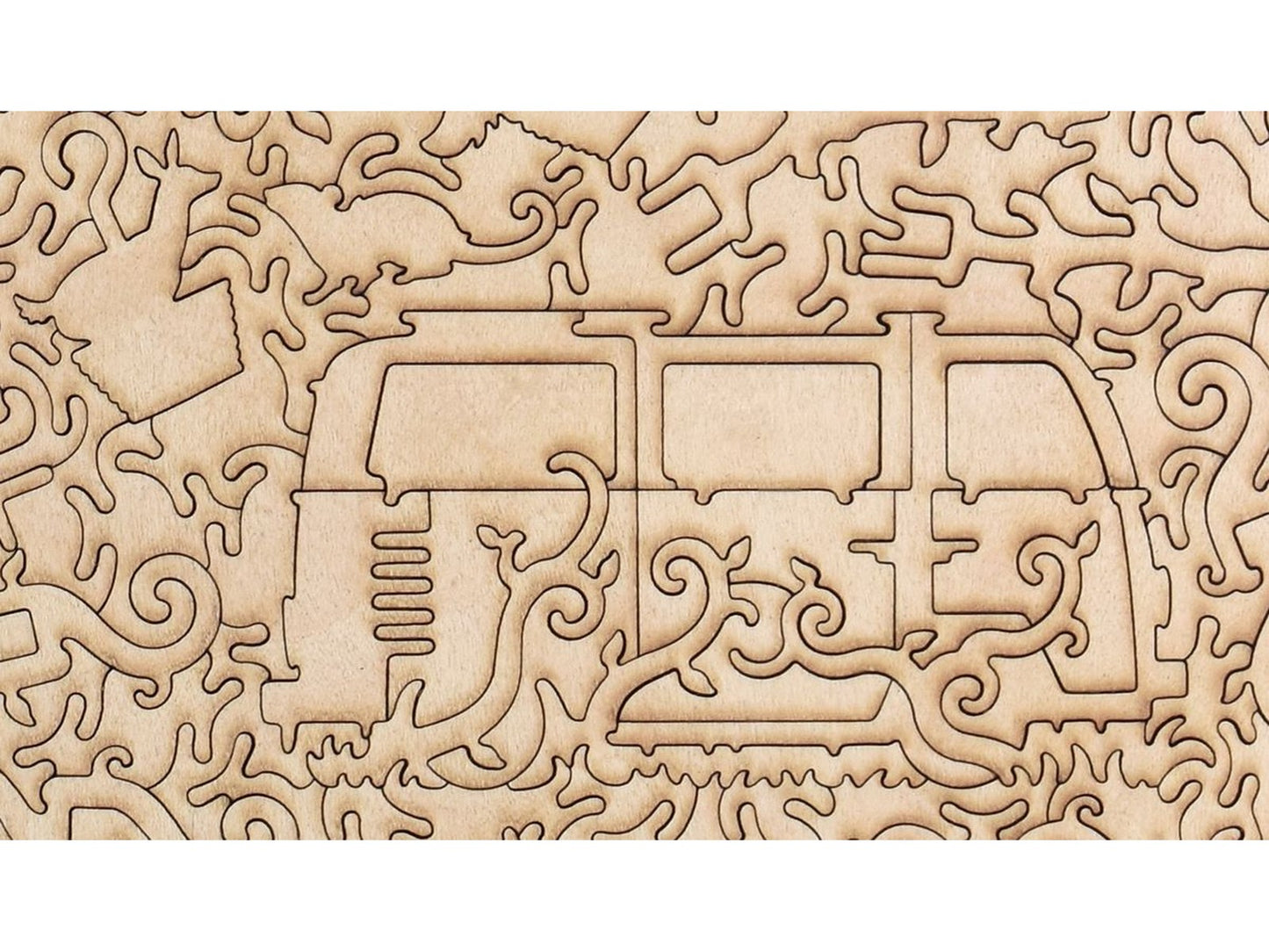A closeup of the back of the puzzle, Woodland Wheel, showing the detail in the pieces.