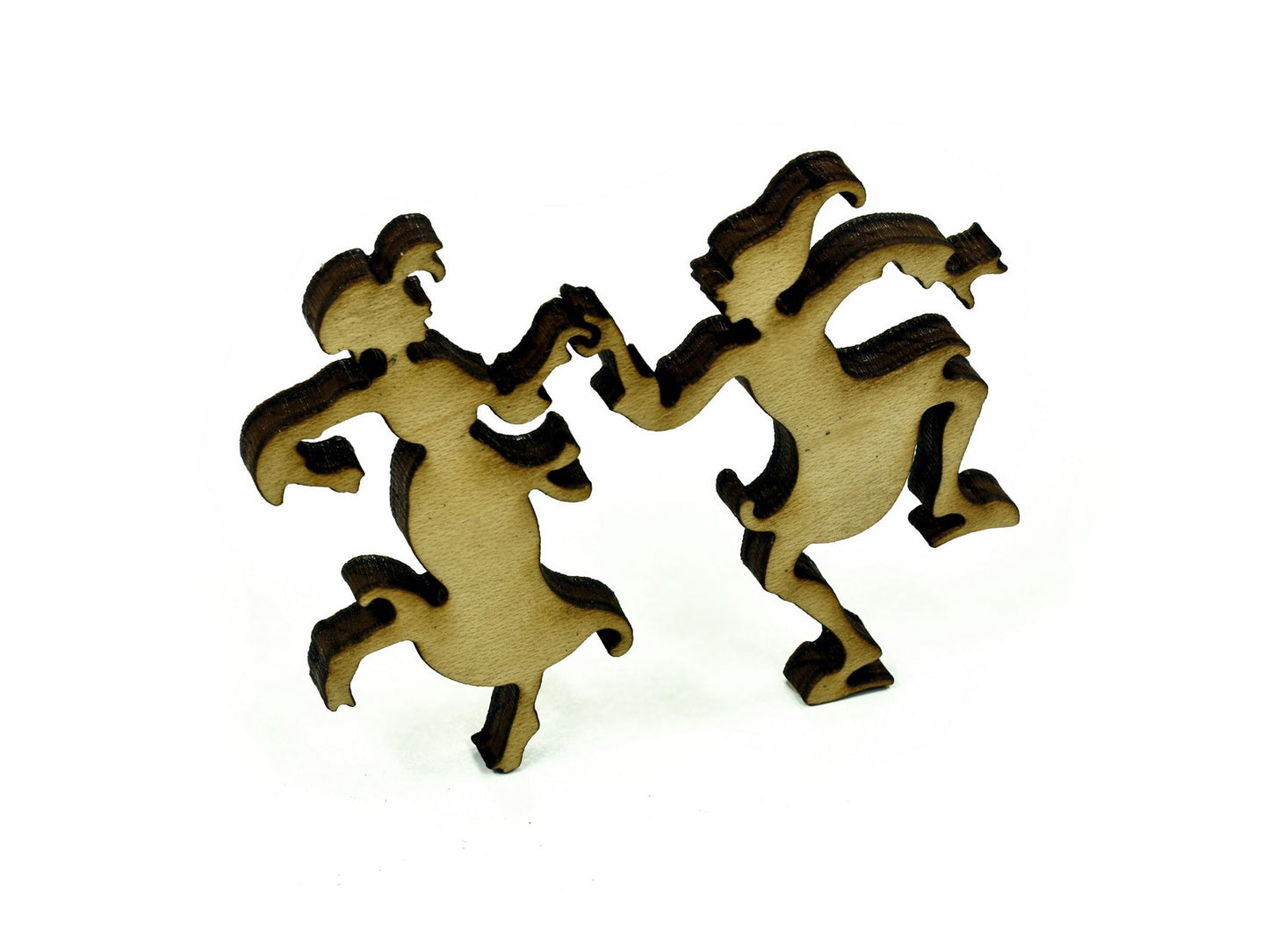 A closeup of pieces in the shape of two people dancing.