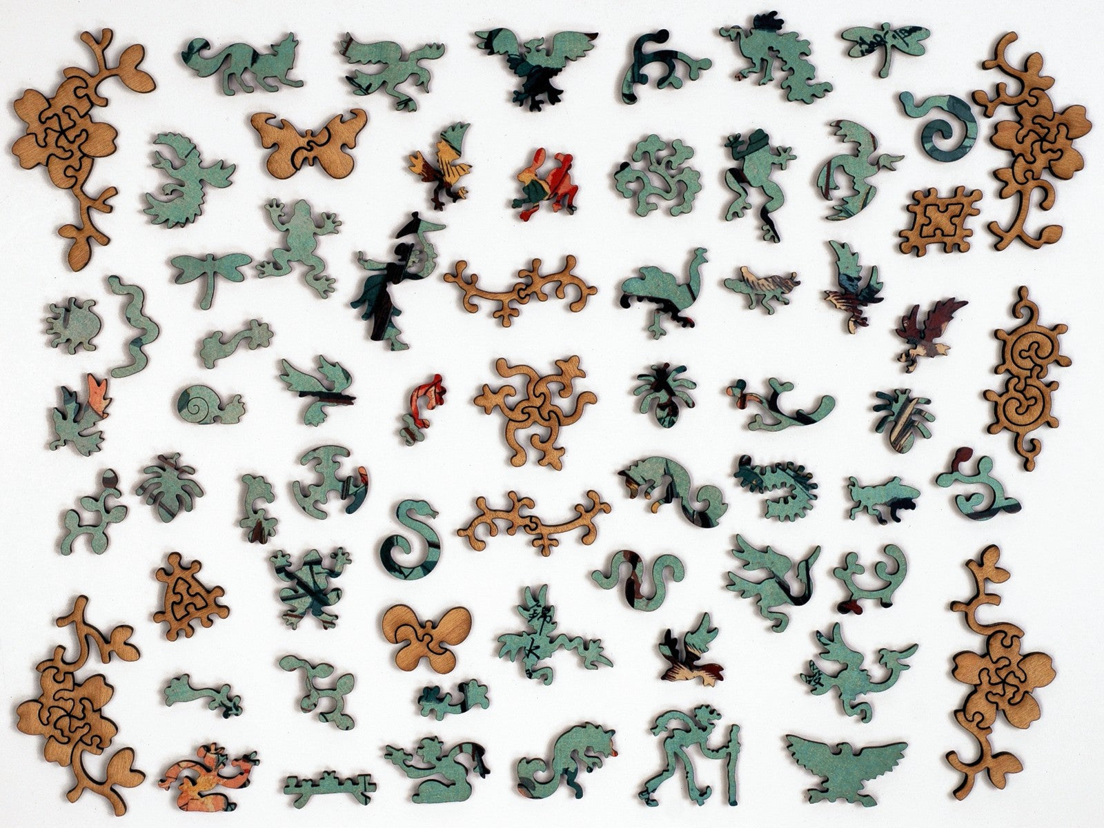 The whimsy pieces that can be found in the puzzle, Birds and Camellia Bushes in Flower.