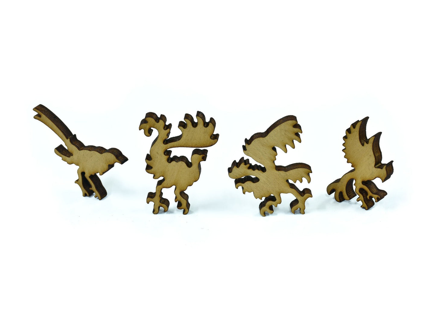 A closeup of pieces in the shape of birds.