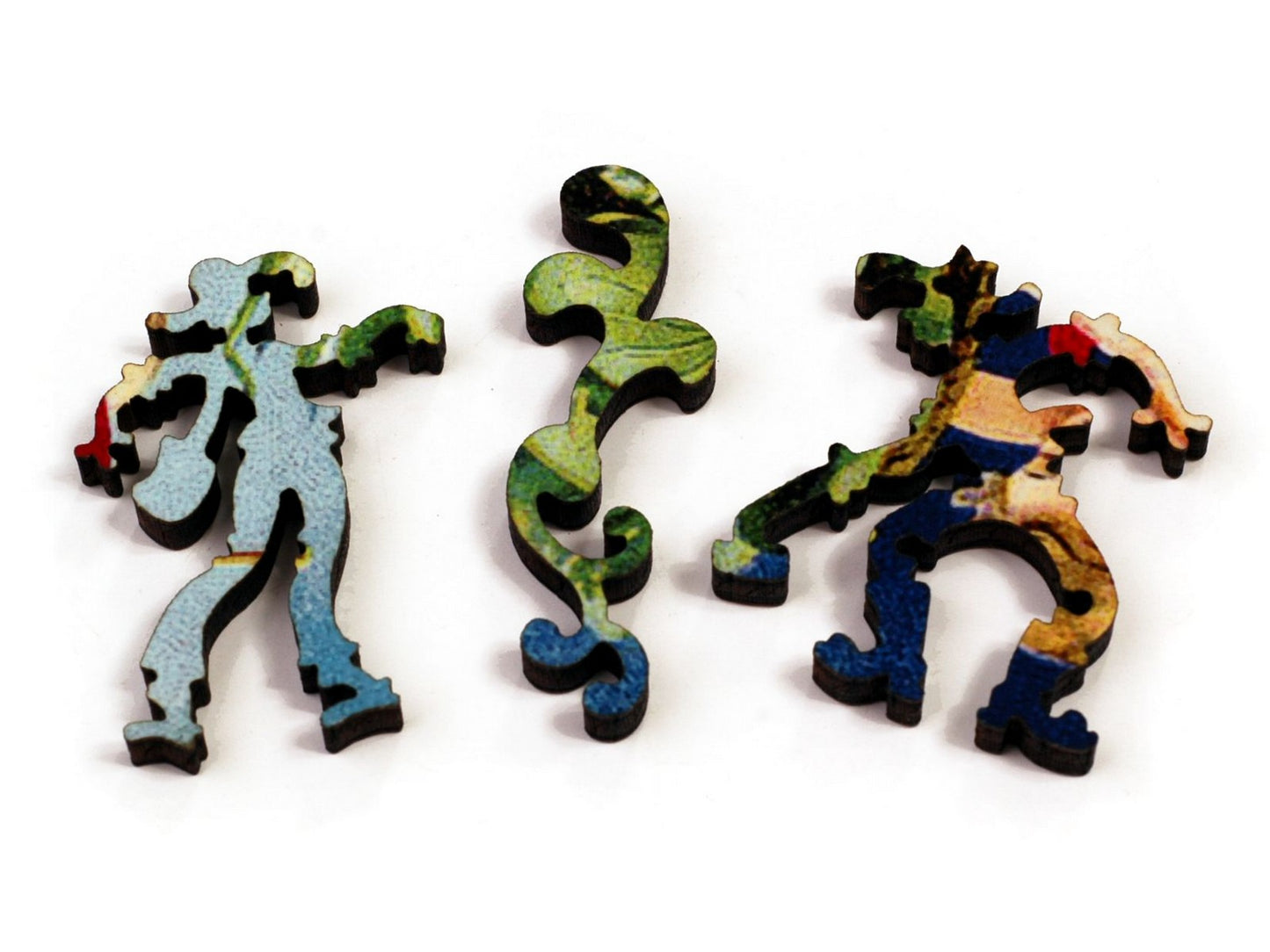 A closeup of pieces showing two people and a sprout.