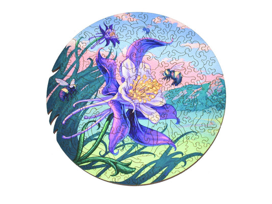 The front of the puzzle, Colorado Columbine, which shows a bee and a purple flower.