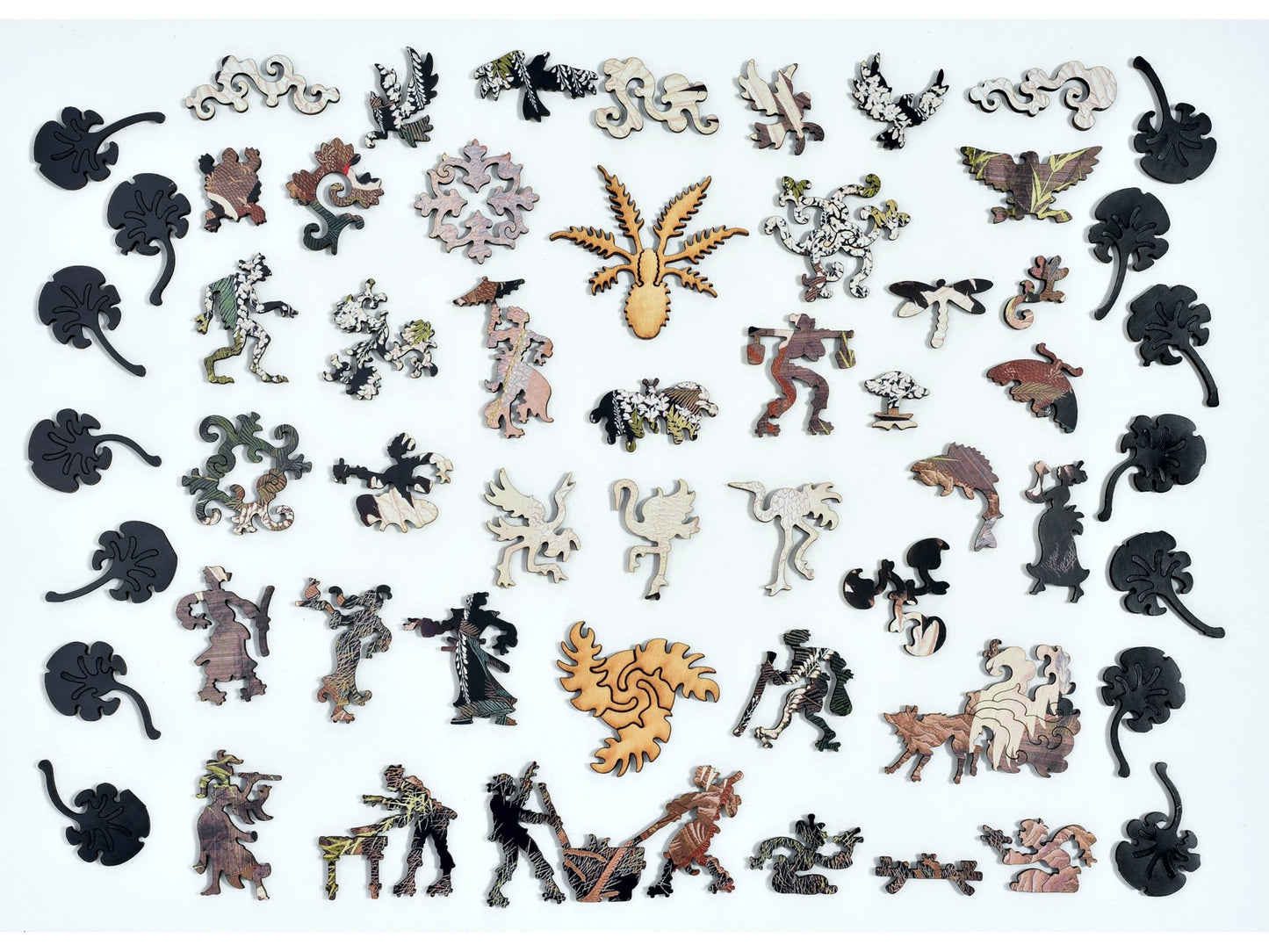 The whimsy pieces that can be found in the puzzle, Cranes, Cycads and Wisteria.
