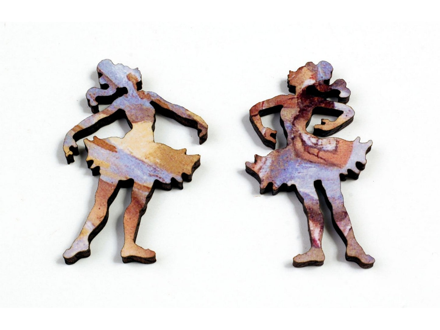 A closeup of some whimsy pieces, picturing two ballerinas.