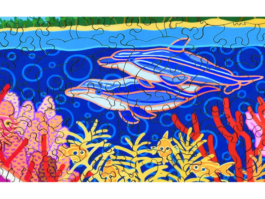 A closeup of the front of the puzzle, Dolphin's Wake, showing the detail in the pieces.