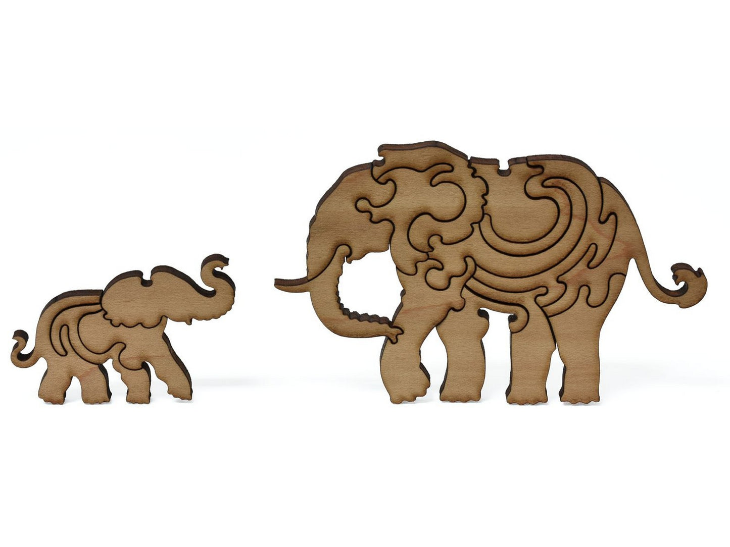 A closeup of pieces showing an elephant and a baby.