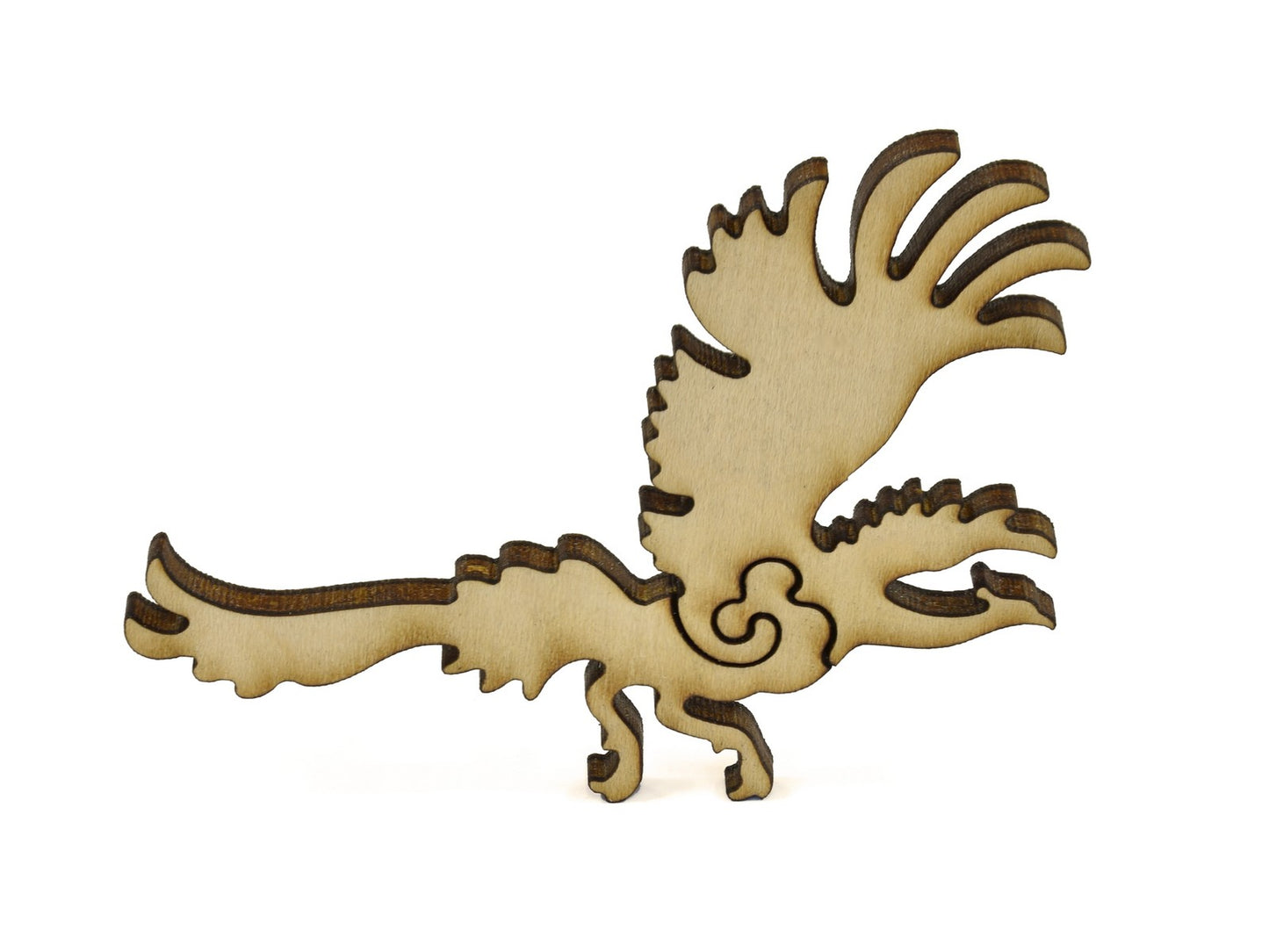 A closeup of pieces in the shape of a peacock.