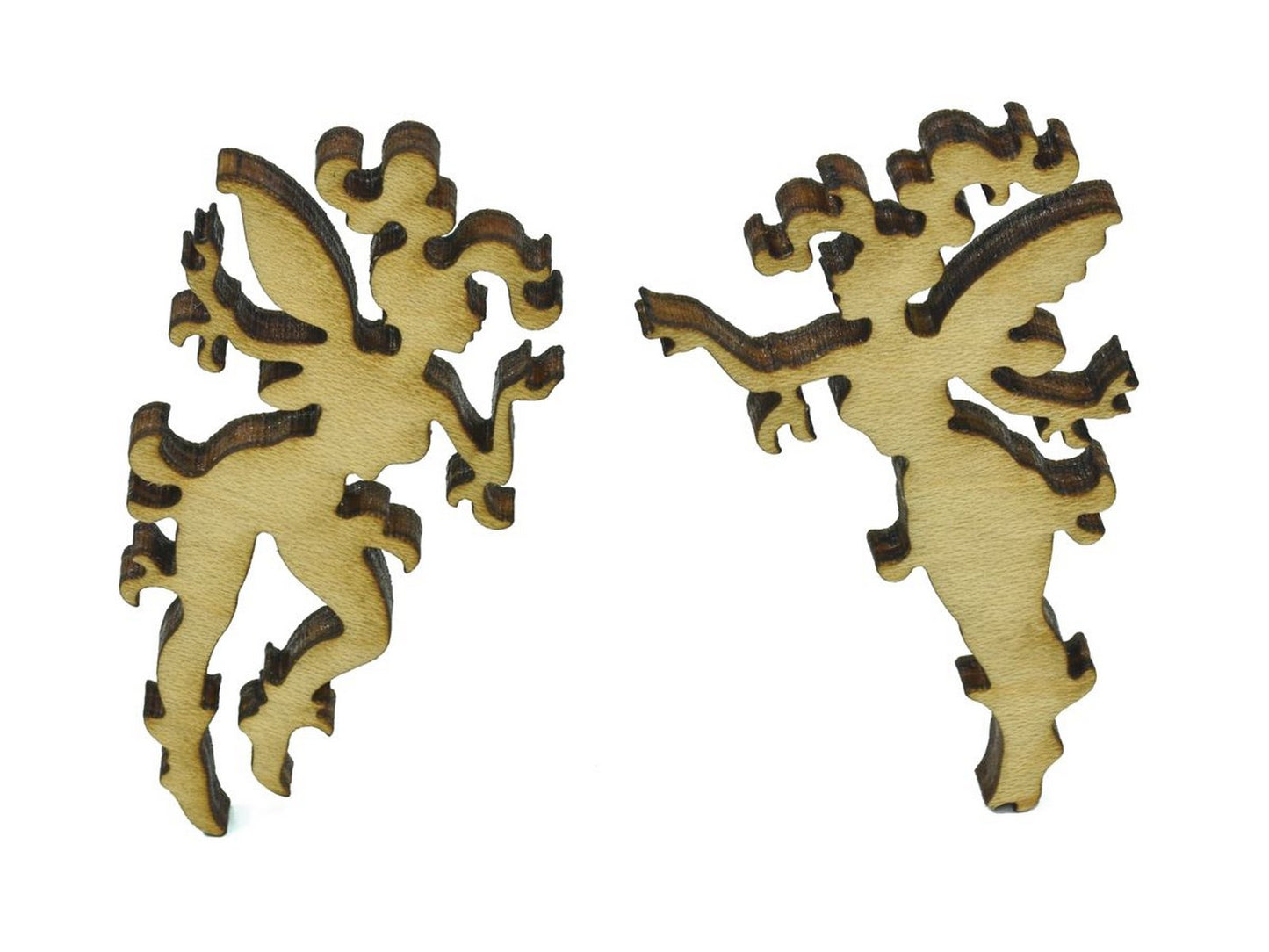A closeup of pieces in the shape of fairies.