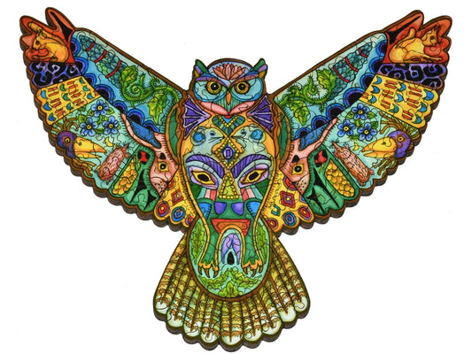 The front of the puzzle, Great Horned Owl Round, which shows various plants and animals in the shape of an owl.