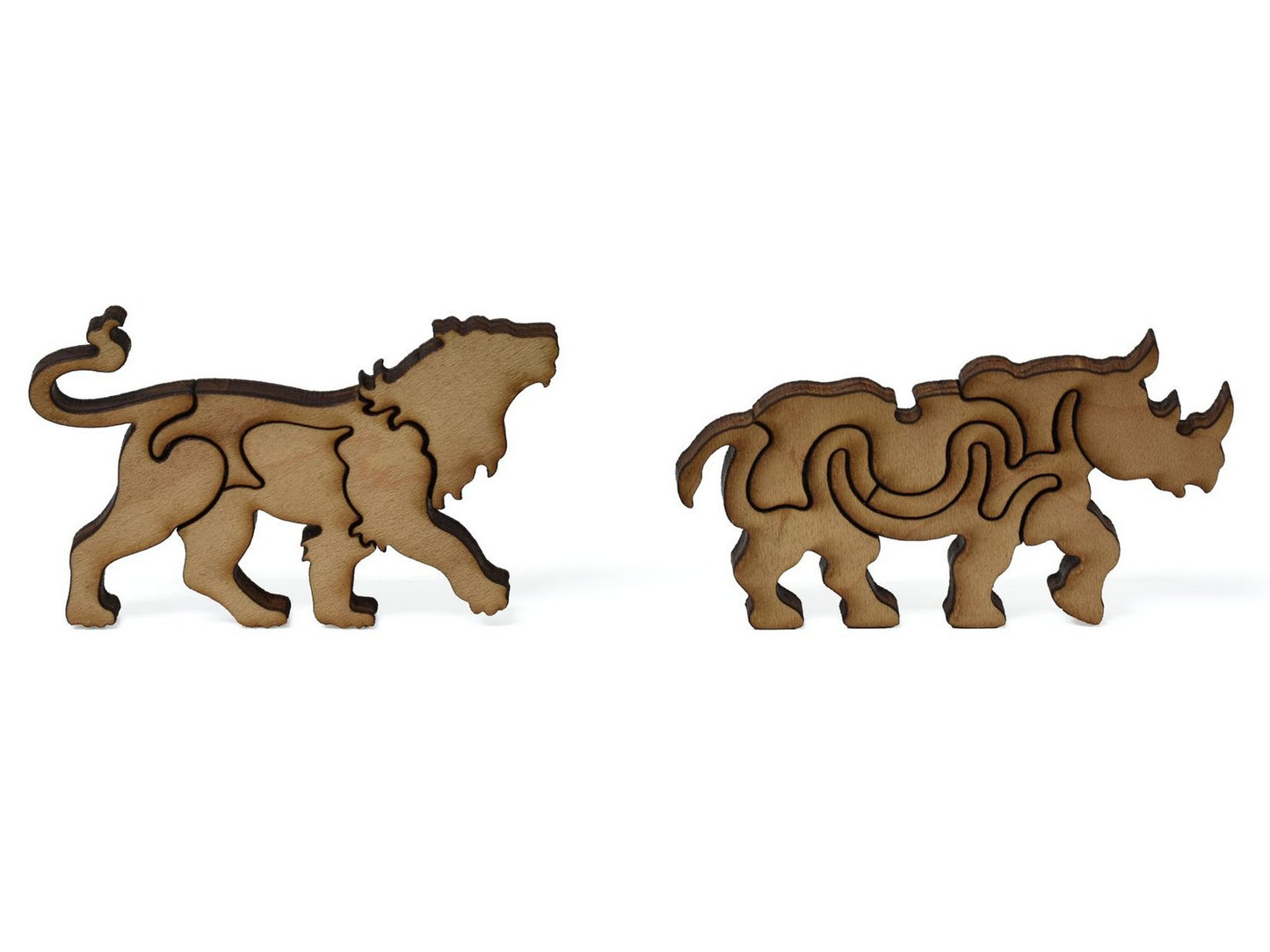 A closeup of pieces showing a lion and a rhinoceros.