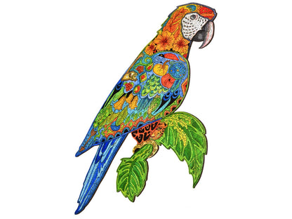The front of the puzzle, Macaw, which shows brightly colored animals and plants, in the shape of a macaw.