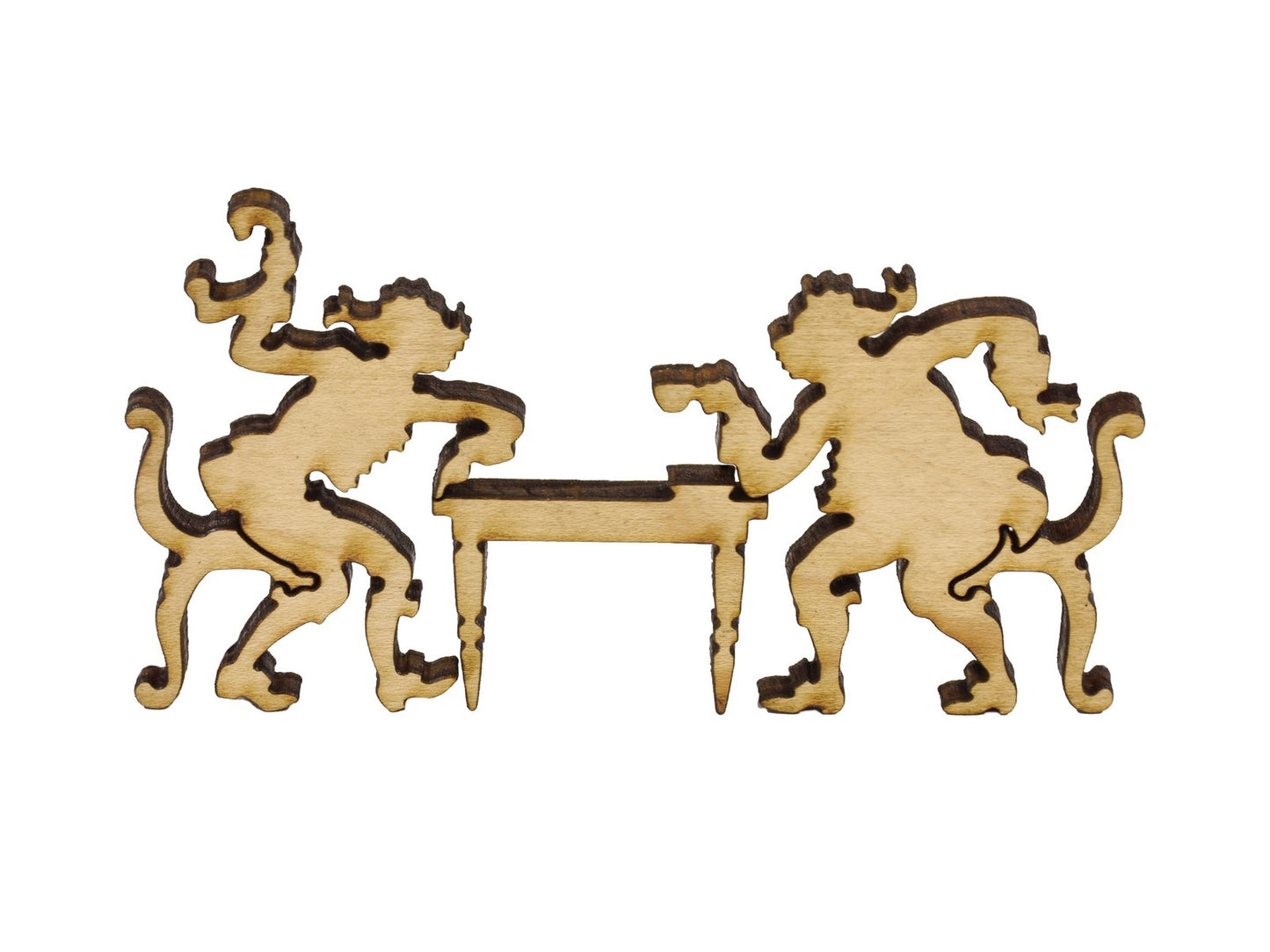 A closeup of pieces in the shape of two people drinking tea at a table.