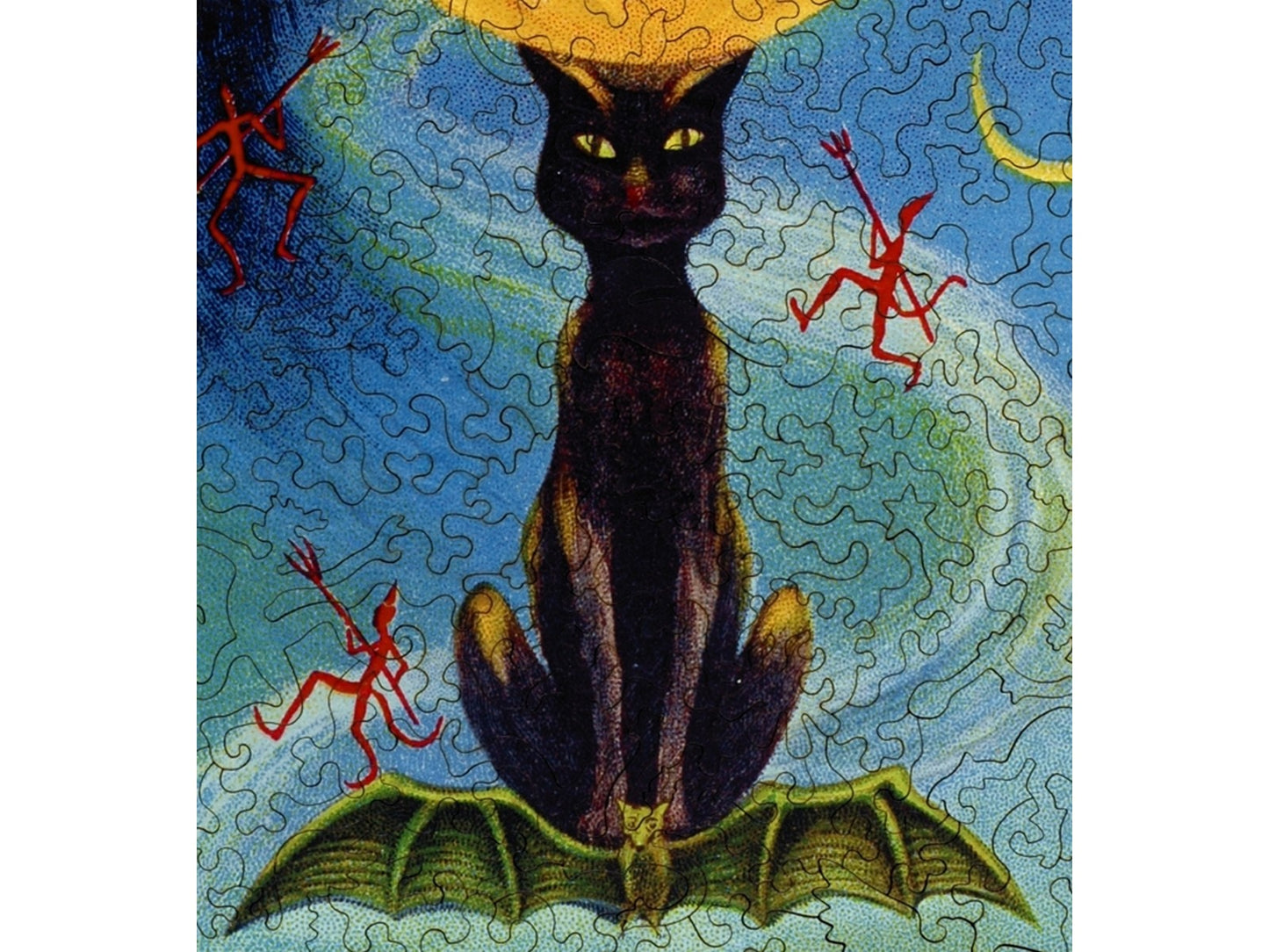 A closeup of the front of the puzzle, Mystic Light of Halloween, showing the detail in the pieces.