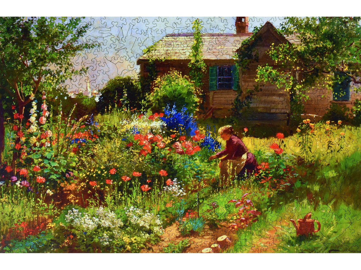 The front of the puzzle, Near Kennebunkport, which shows a country cottage with a large flower garden.