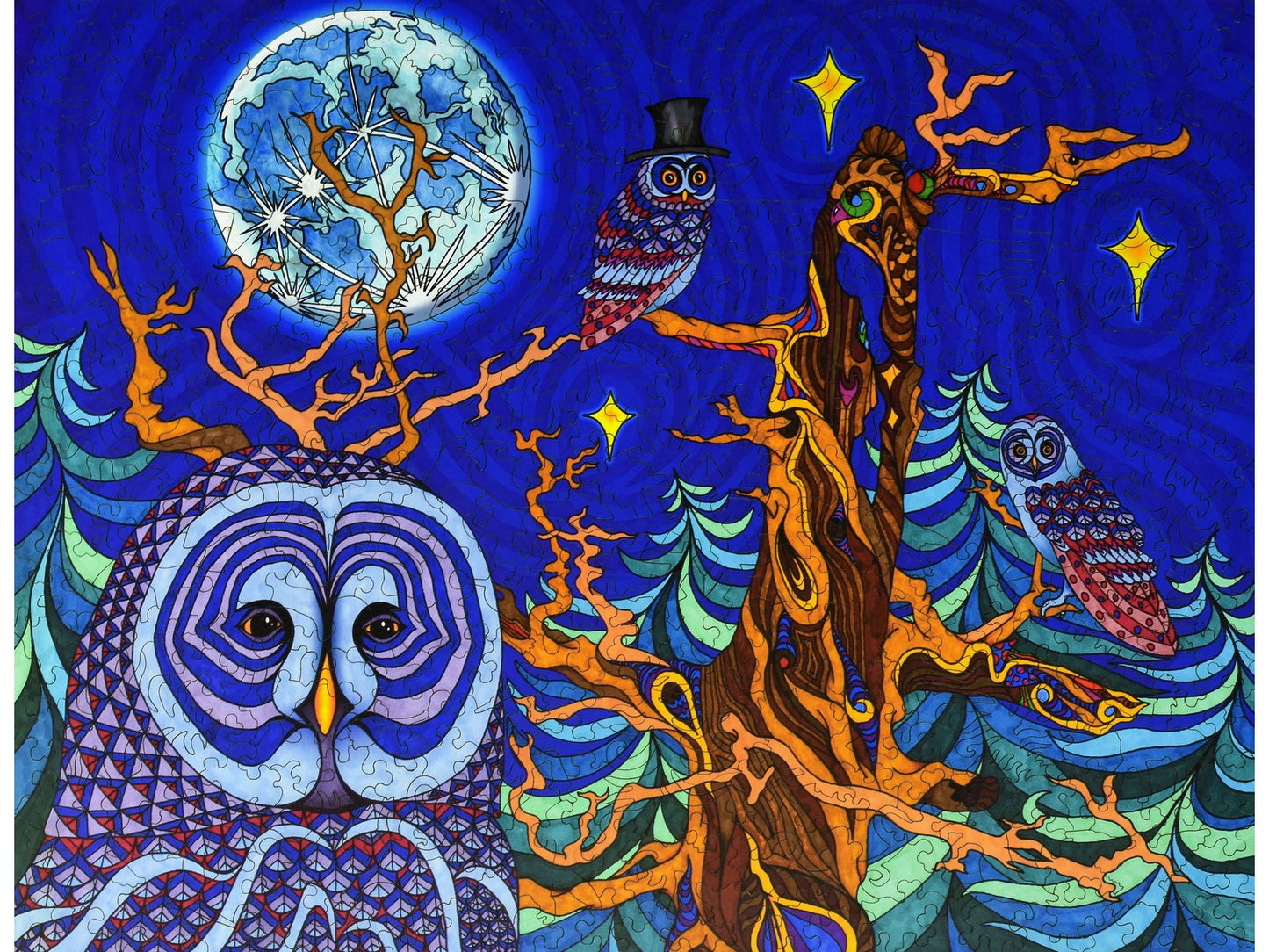The front of the puzzle, The Night Owls, which shows three owls in a forest at night, under the full moon.