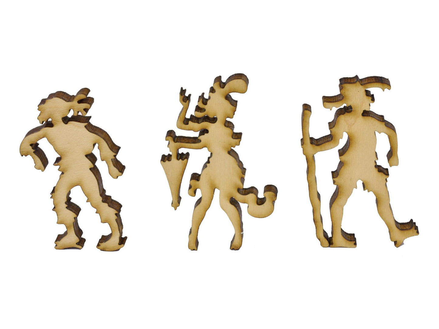 A closeup of pieces in the shape of three people.