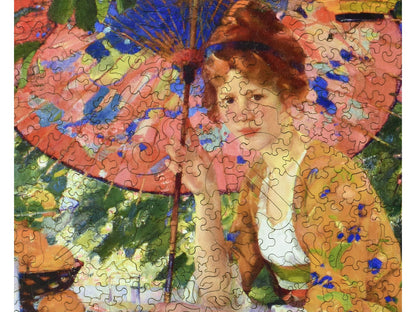 A closeup of the front of the puzzle, Red-Headed Girl with Parasol.