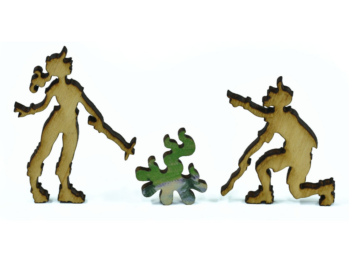 A closeup of pieces in the shape of two people around a campfire.