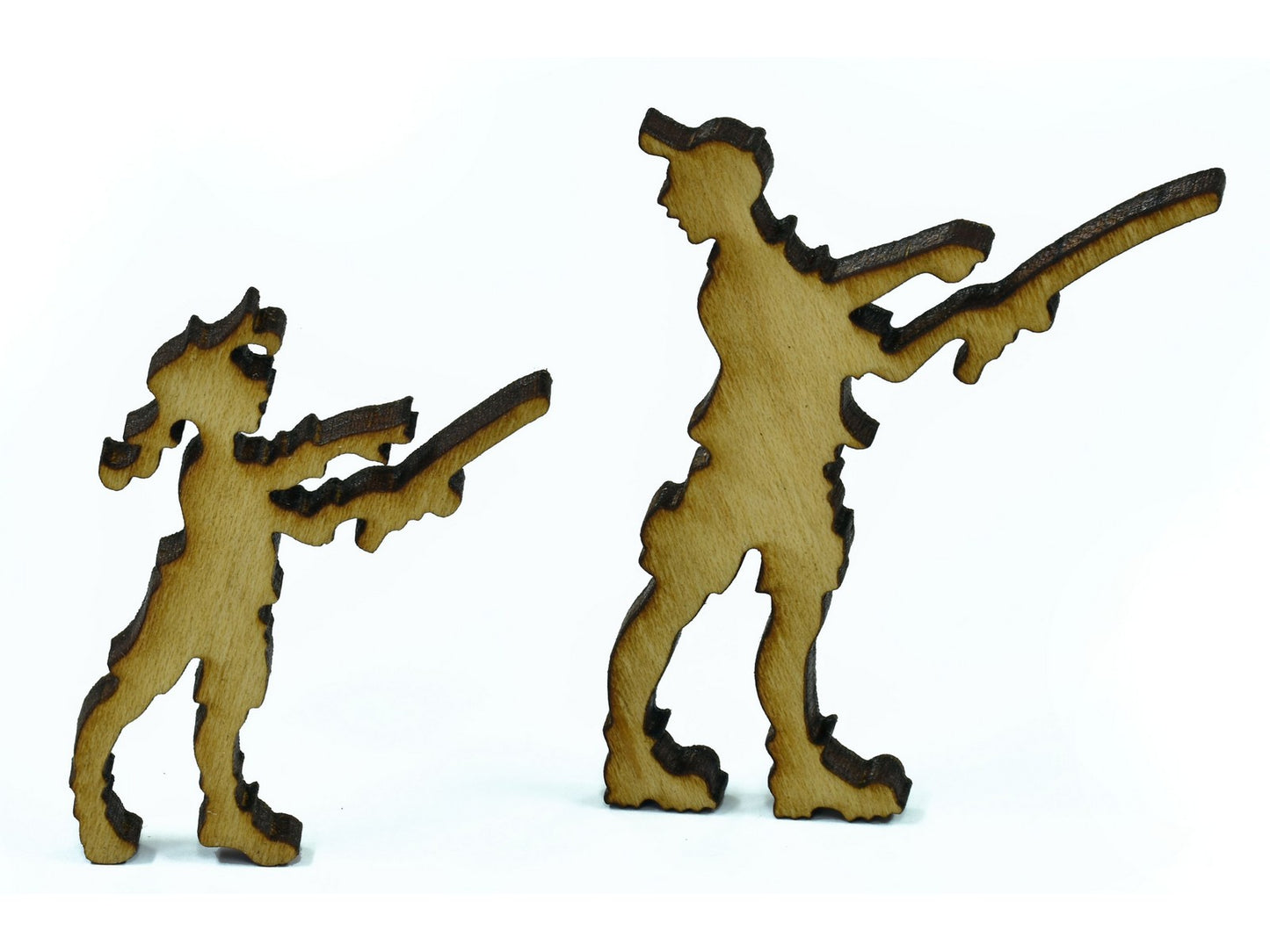 A closeup of pieces in the shape of two people fishing.