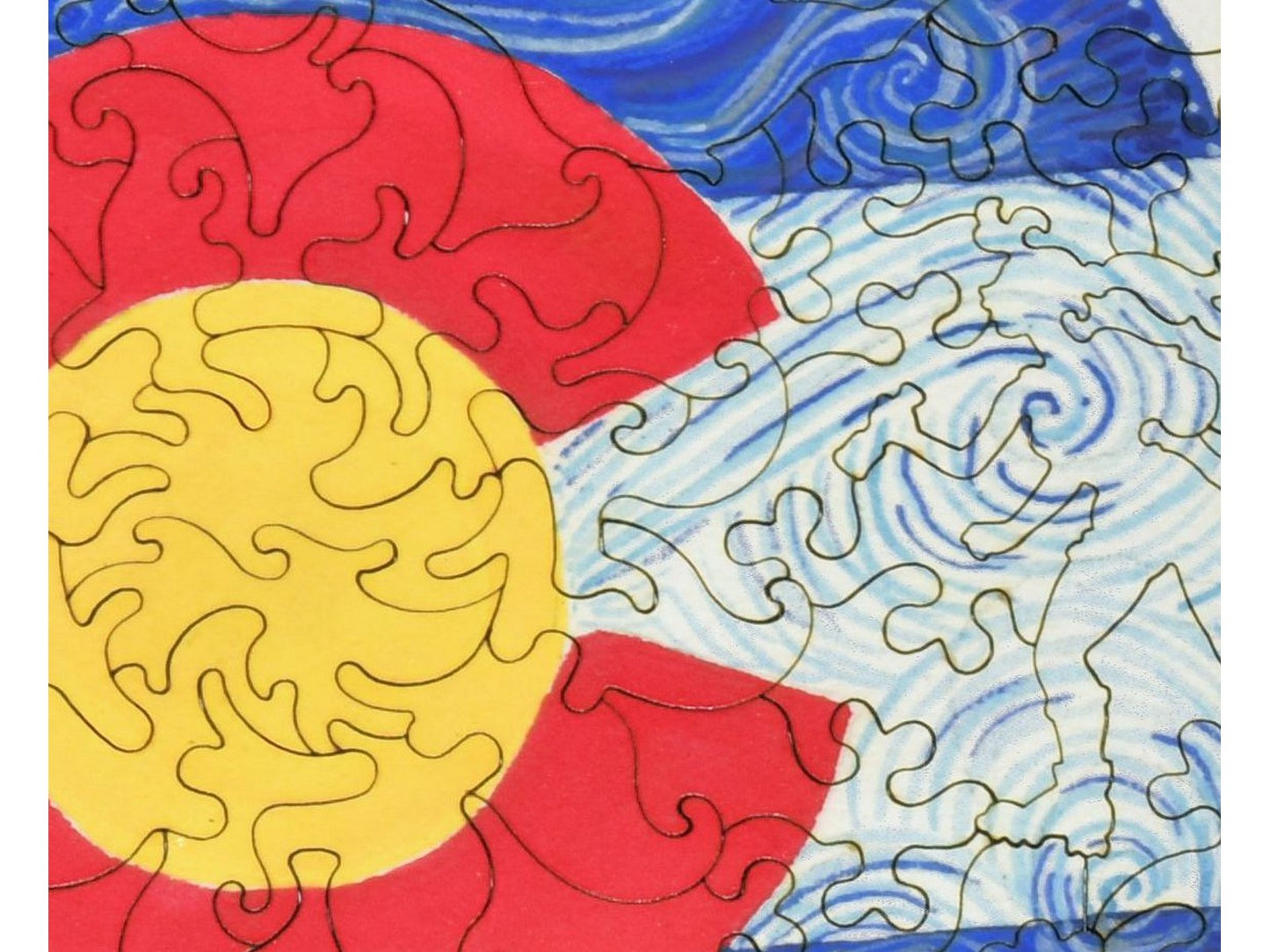 A closeup of the front of the puzzle, Colorado Flag Round, showing the detail in the pieces.