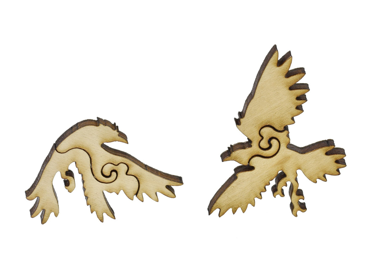 A closeup of pieces in the shape of birds.