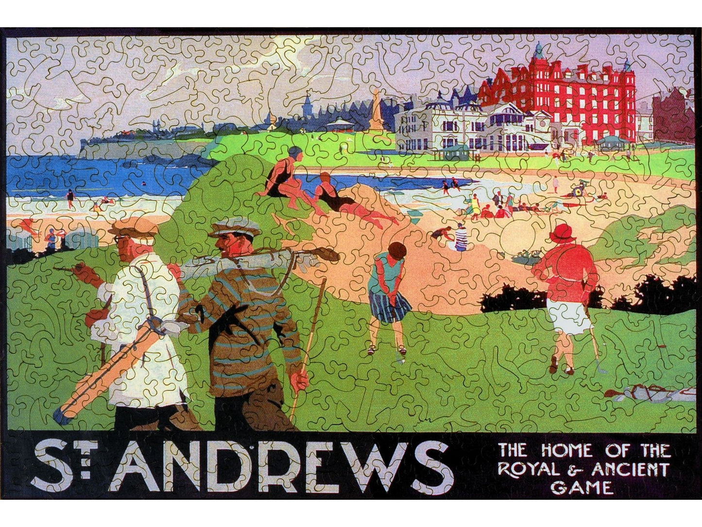 The front of the puzzle, St. Andrews, which shows people playing golf and sunbathing in a coastal town.