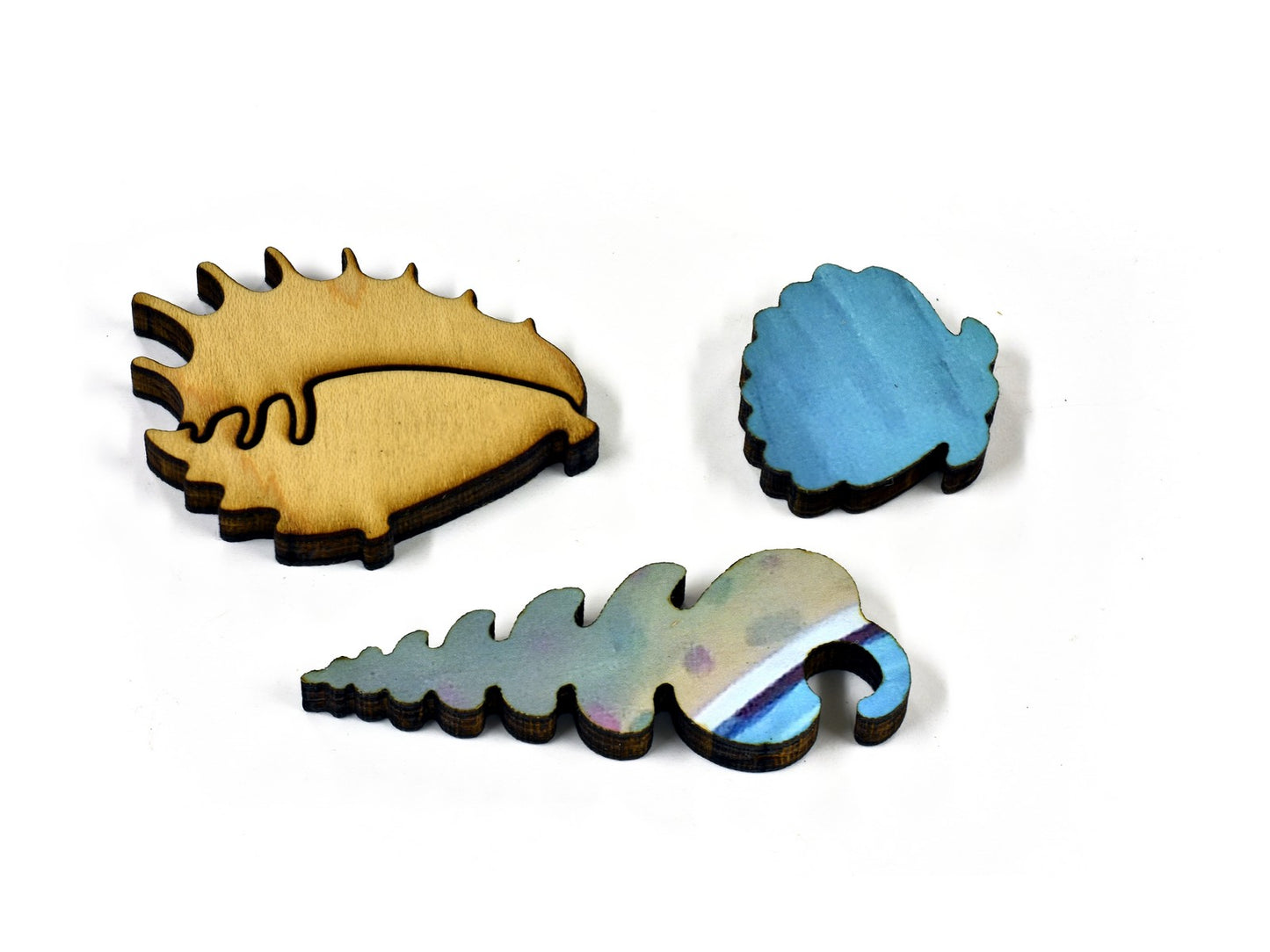 A closeup of pieces in the shape of seashells.