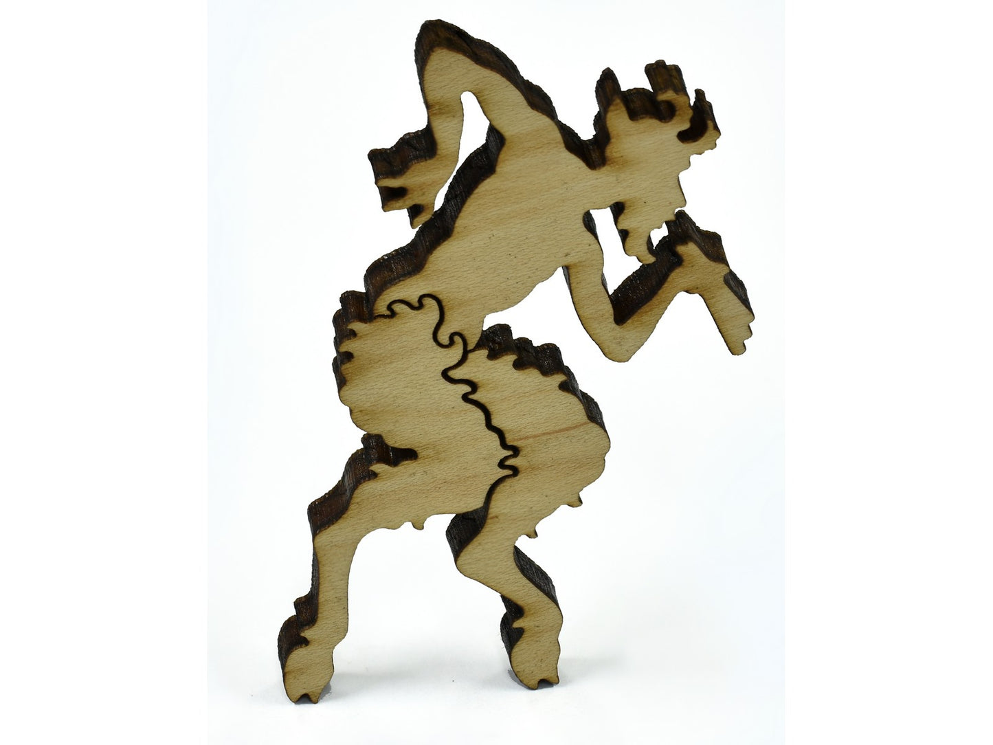 A closeup of pieces in the shape of the god Pan.