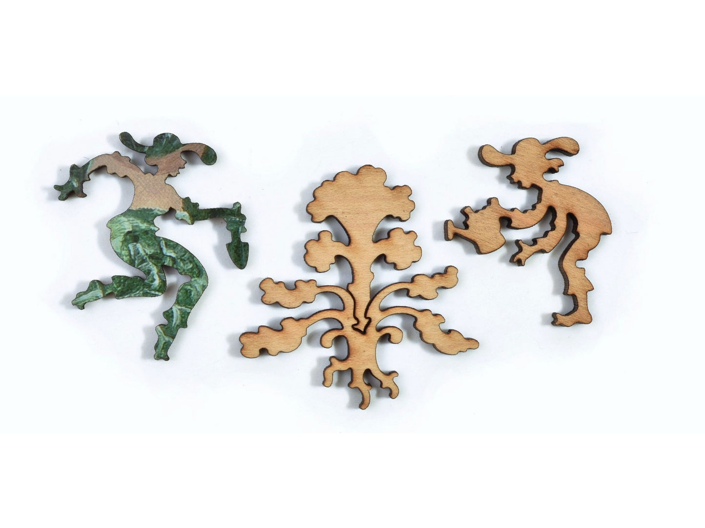 A closeup of pieces in the shape of a two people taking care if a plant.