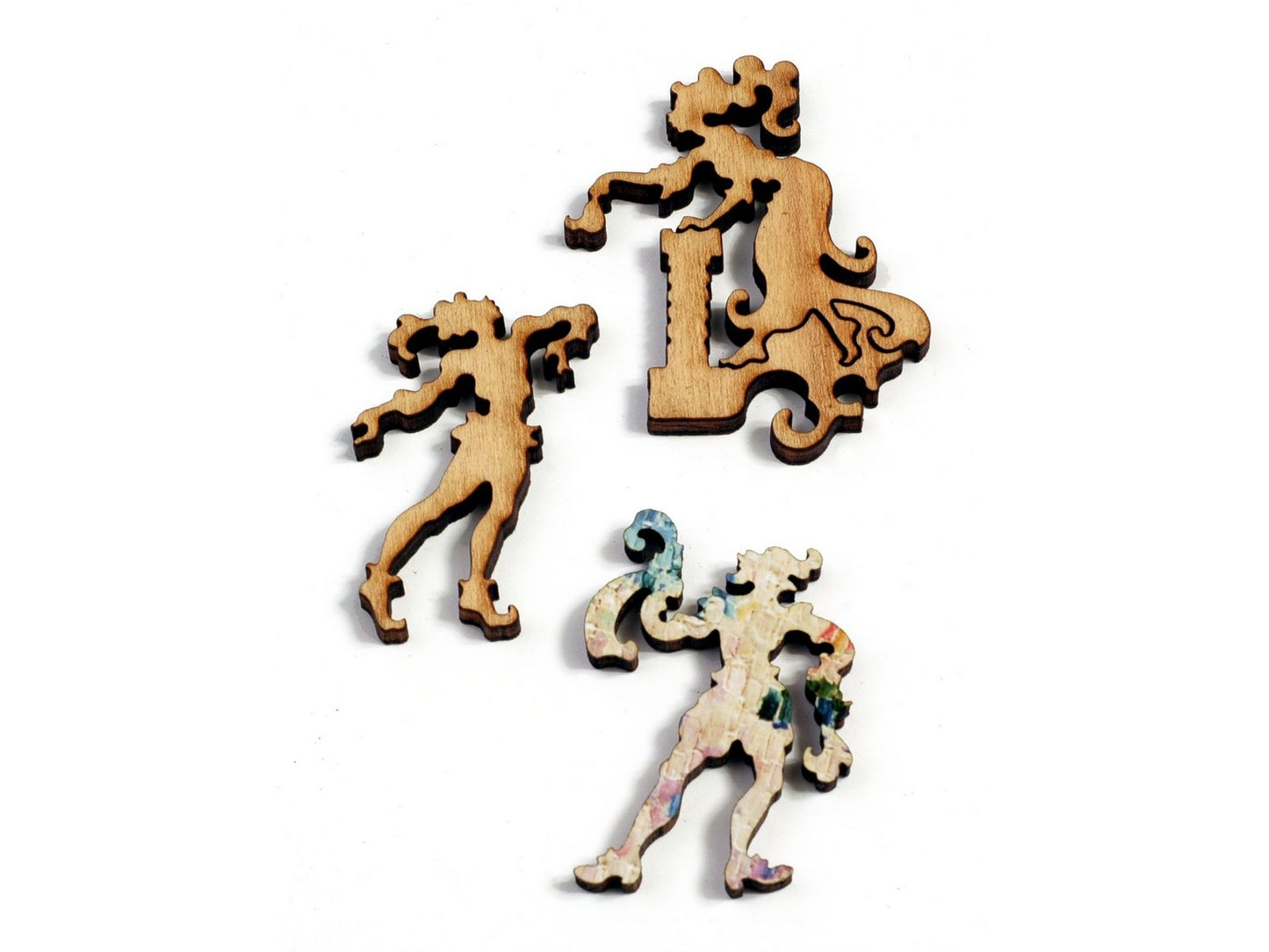 A closeup of pieces, in the shape of three people, a woman on a balcony with two men below.