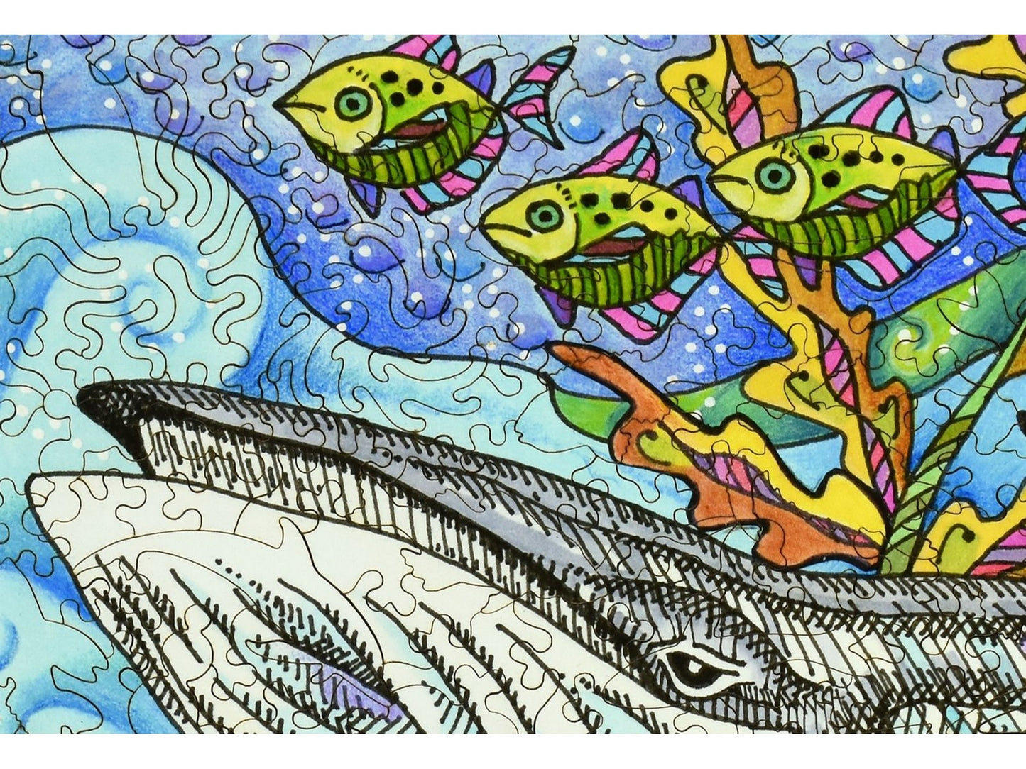 A closeup of the front of the puzzle, Under the Sea, showing the detail in the pieces.