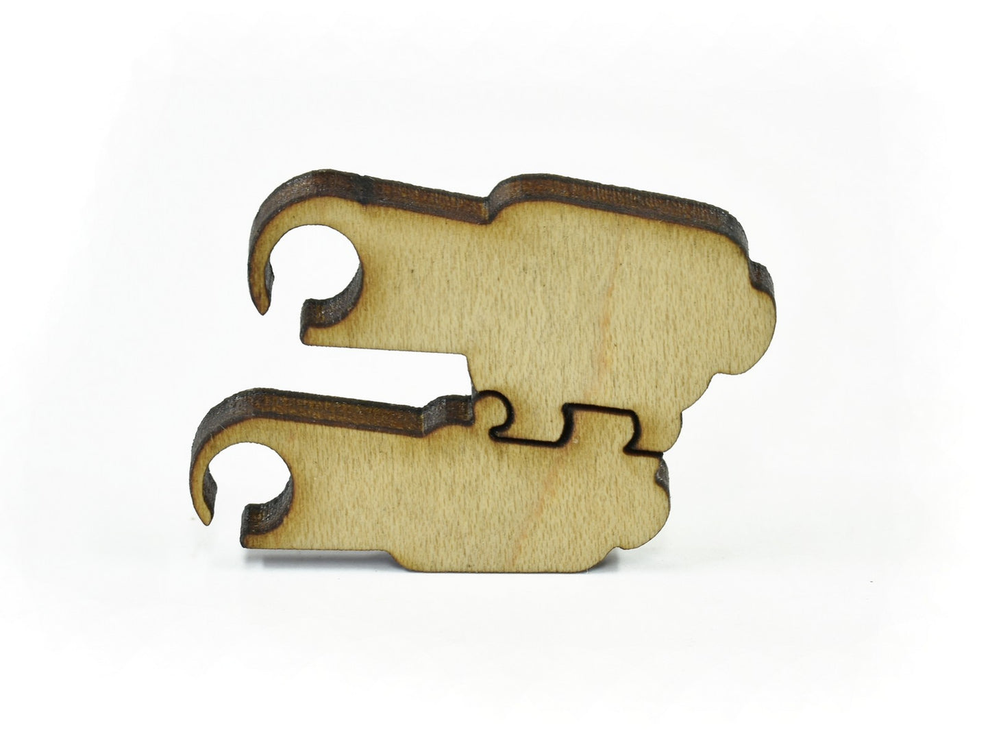 A closeup of pieces in the shape of Binoculars.