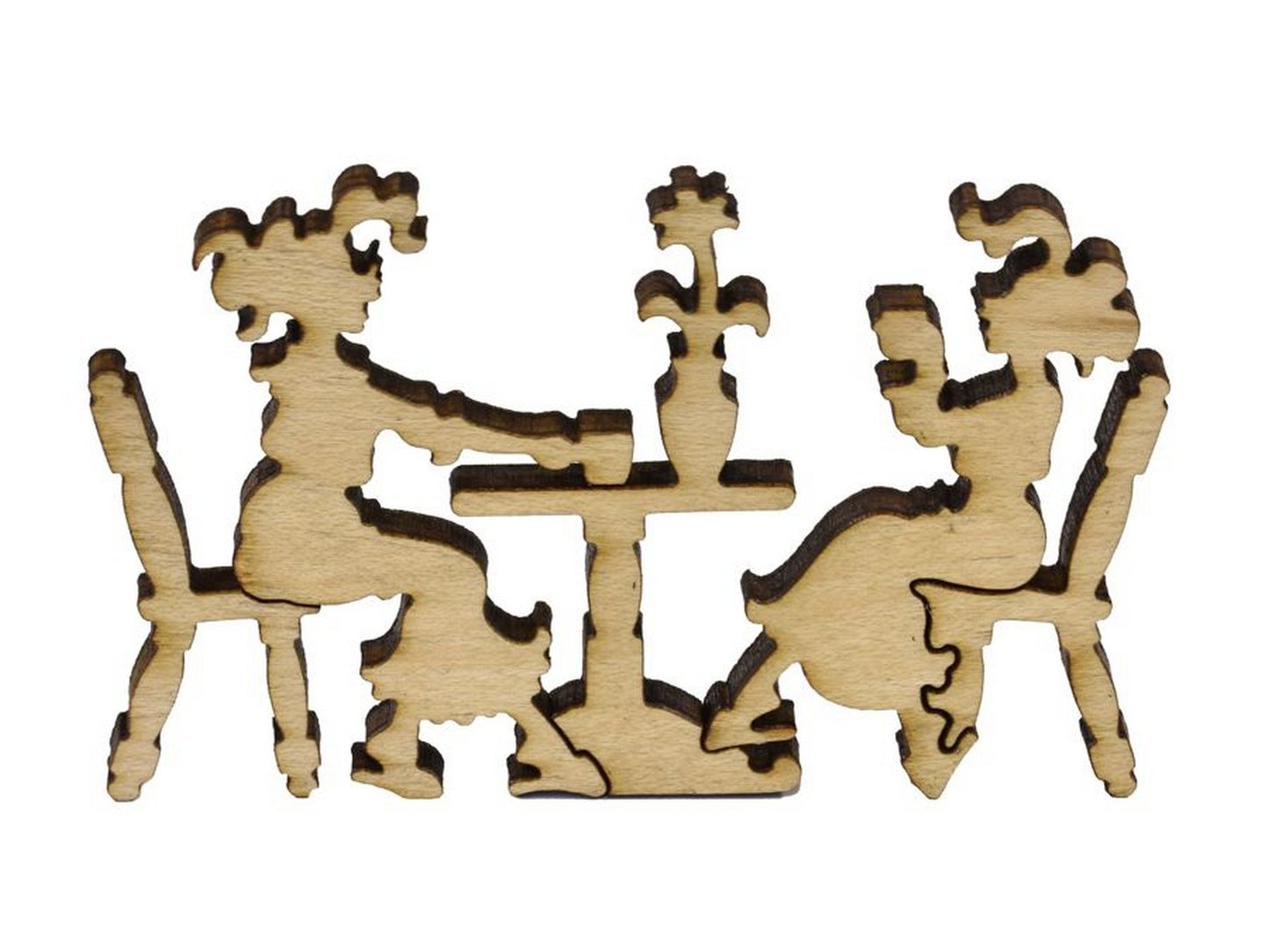 A closeup of pieces in the shape of two people at a table.