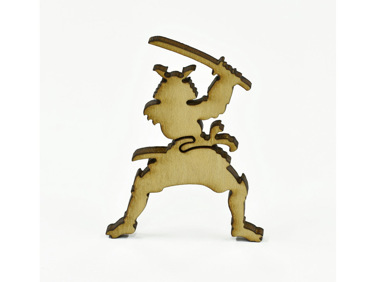 A closeup of pieces in the shape of a samurai.