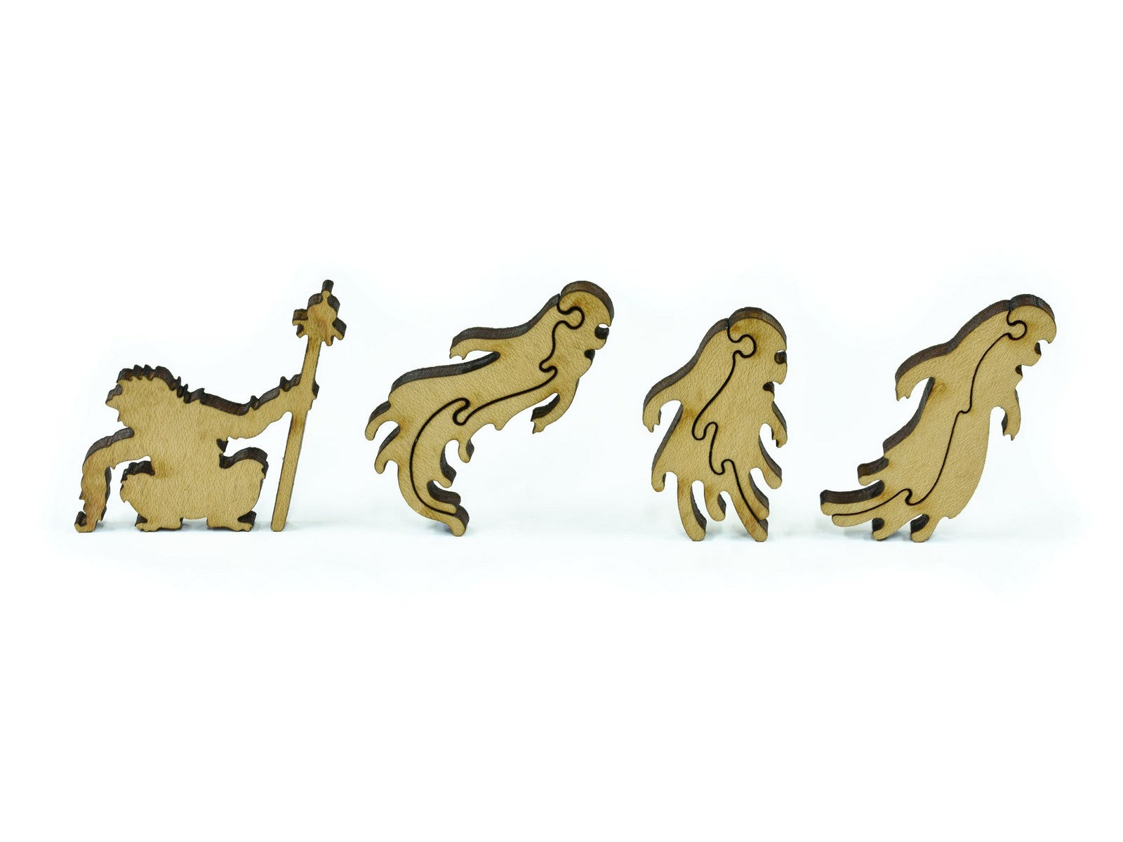 A closeup of pieces in the shape of a monkey and spirits.