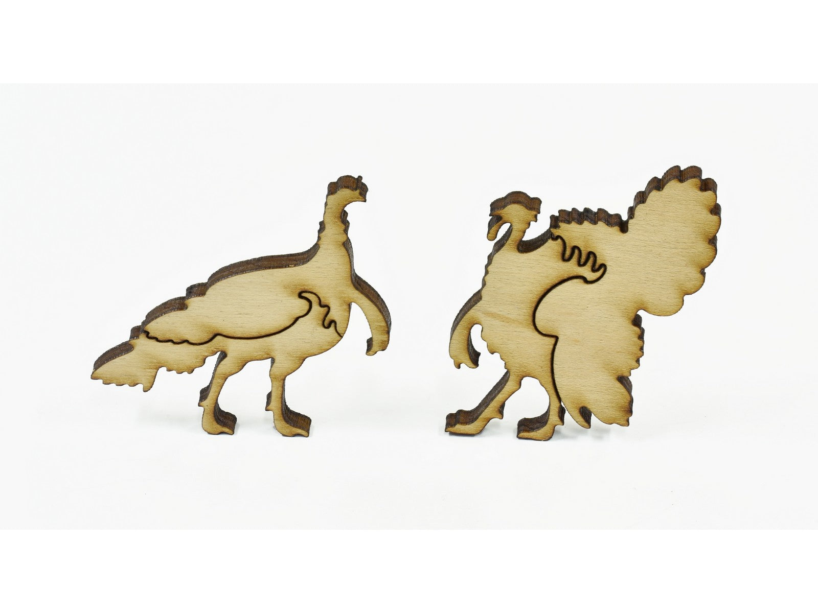 A closeup of pieces in the shape of turkeys.