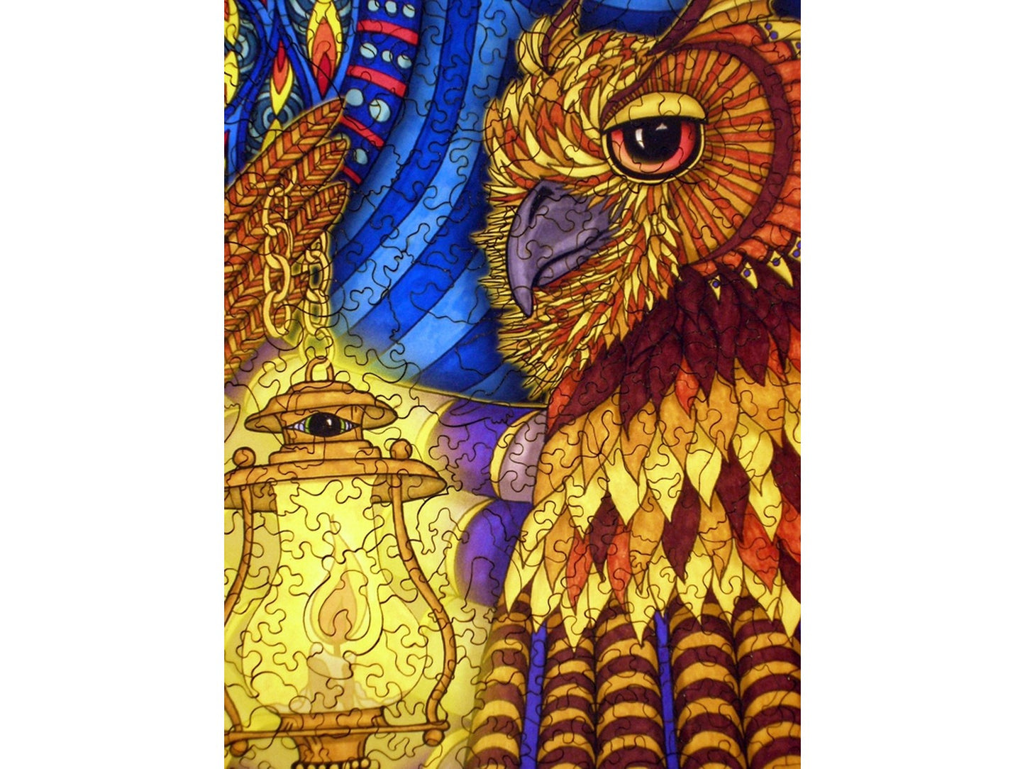 A closeup of the front of the puzzle, Winter Carnival III, showing the detail in the pieces.