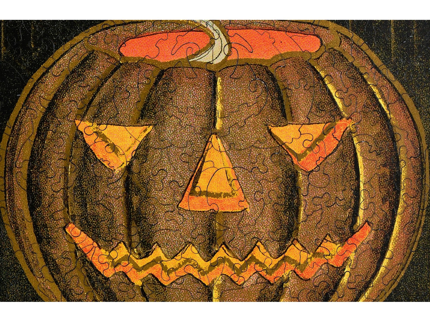 A closeup of the front of the puzzle, Witches Brew, showing the detail in the pieces.